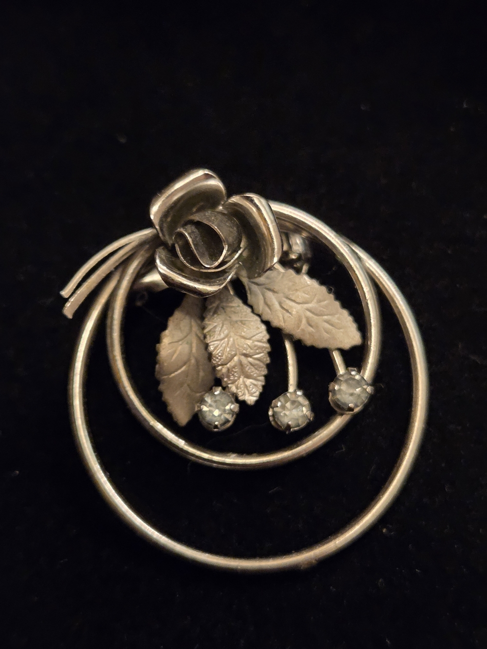 Vintage Silver Tone Circle Floral Brooch with Rhinestone Accents